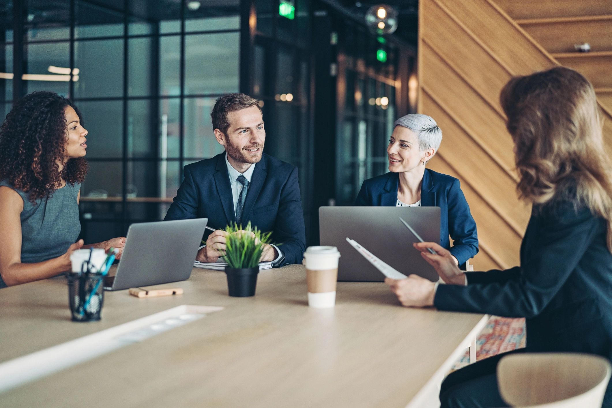 Business team discussing strategy around a table