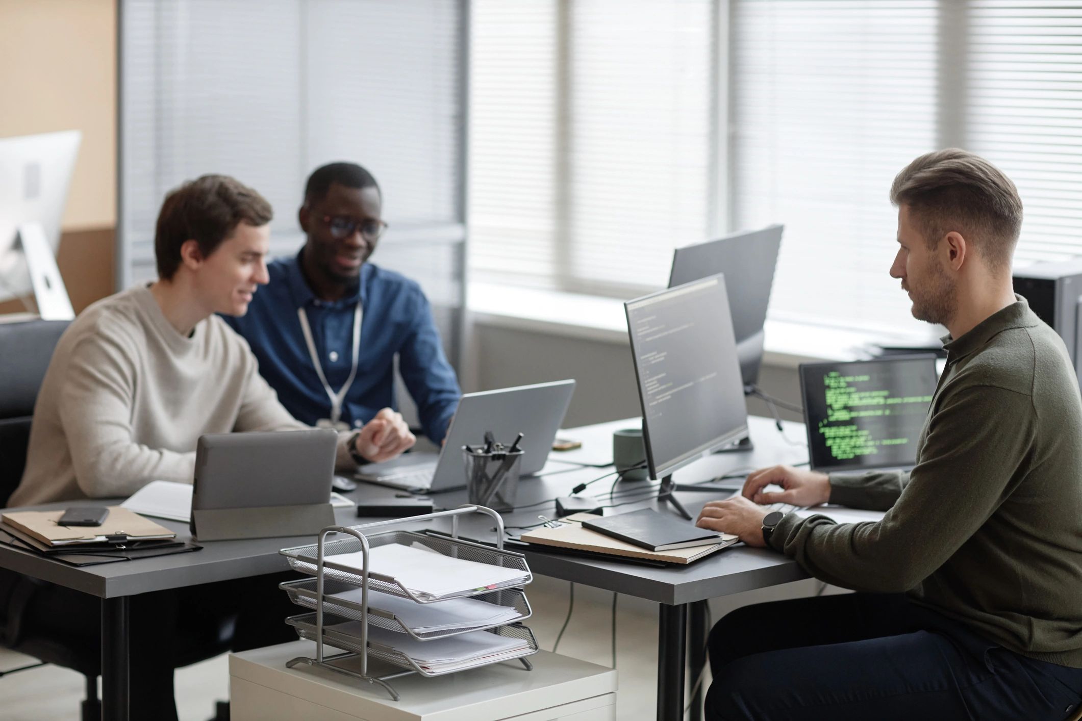 Technology team collaborating in a modern office